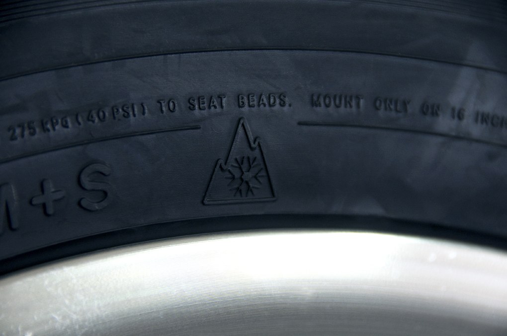 M+S lettering and a mountain-and-snowflake marking on a tyre sidewall