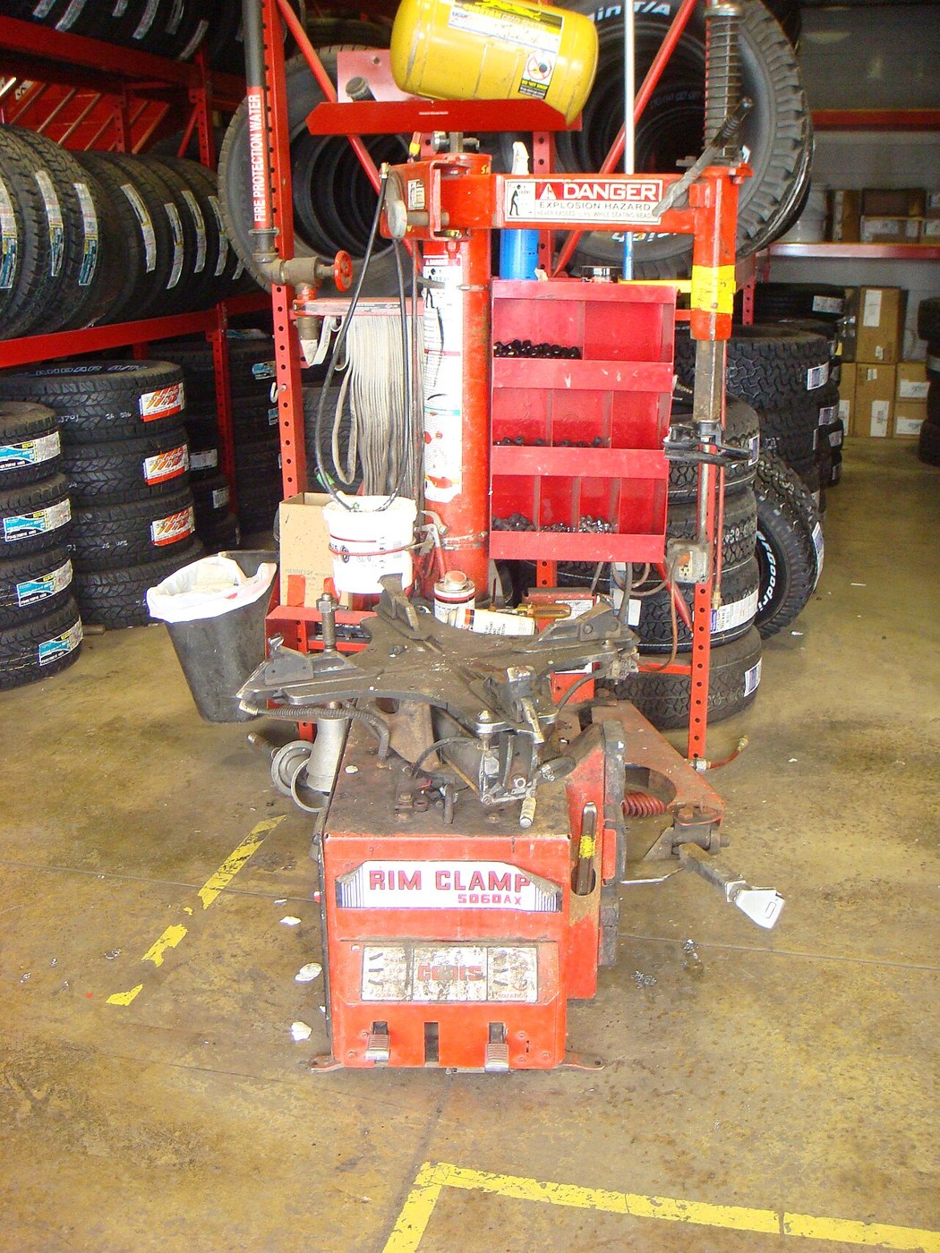 Tyre-fitting machine in a workshop